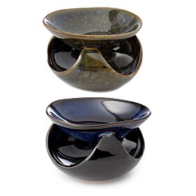 Ciemno niebieska podstawka na świece o abstrakcyjnym kształcie